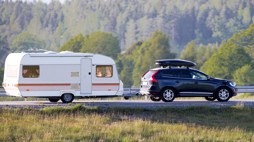 Car towing caravan